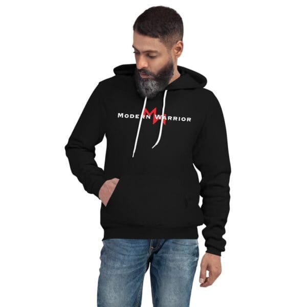 A man donning a Modern Warrior Hoodie with a red logo on it.