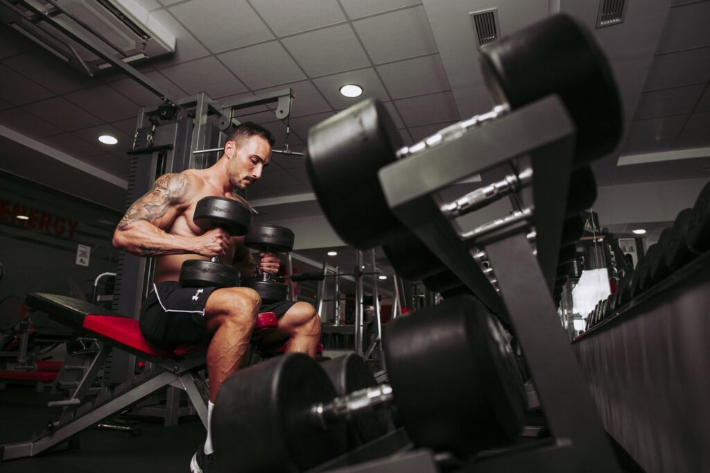 Muscular man training in gym