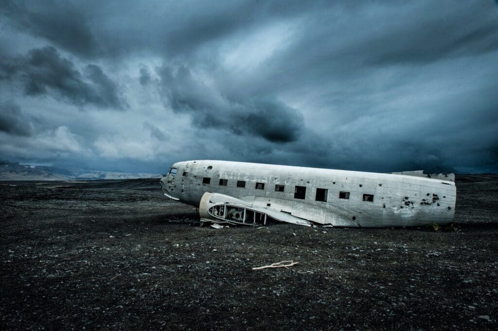 The remains of a crashed plane. Iceland. Side of volcanic beach.