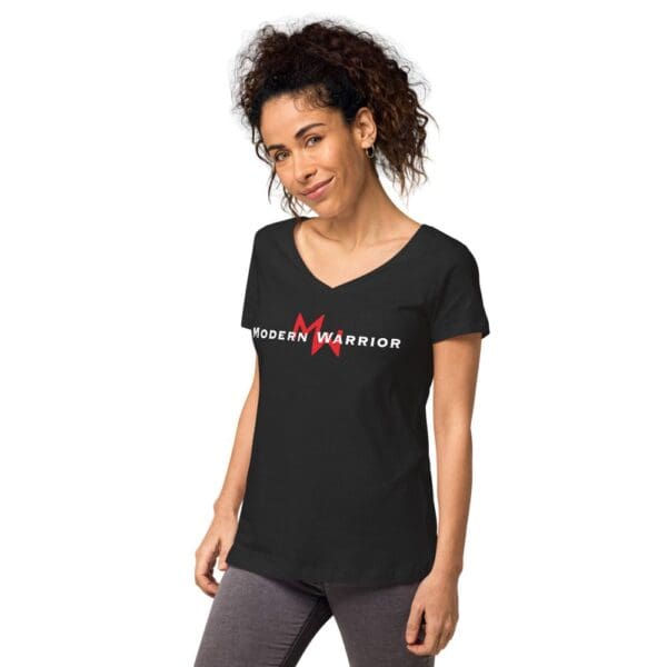 A woman donning a MW Combatives Women’s fitted V-neck T in black.