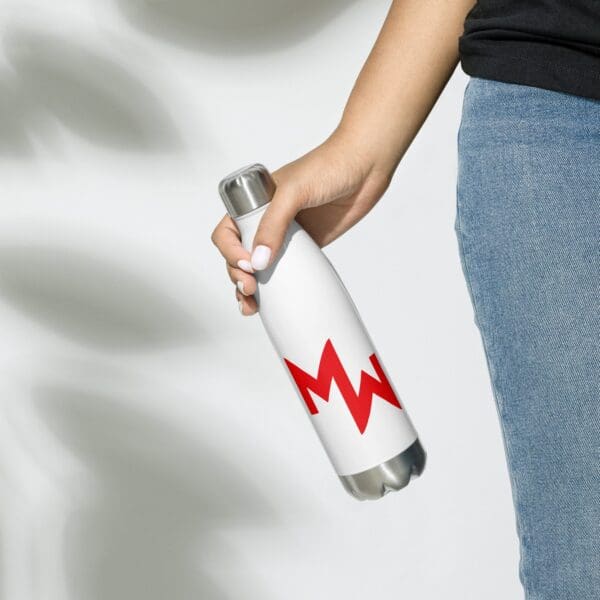 A woman holding a MW Stainless Steel Water Bottle.