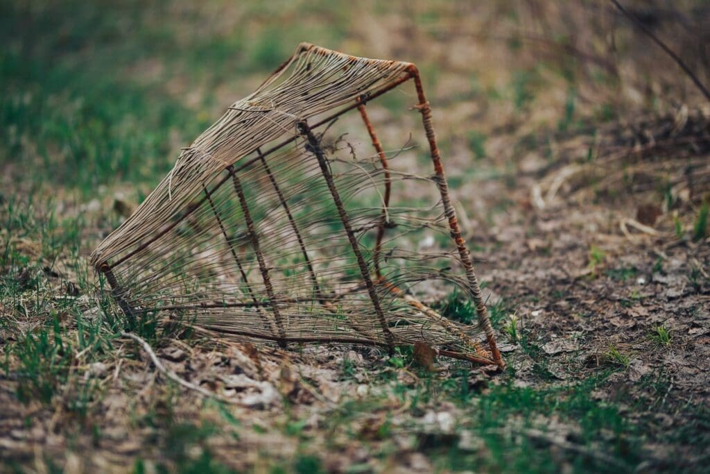 Summer, countryside, pond. snare for fish, manual work. Vintage style