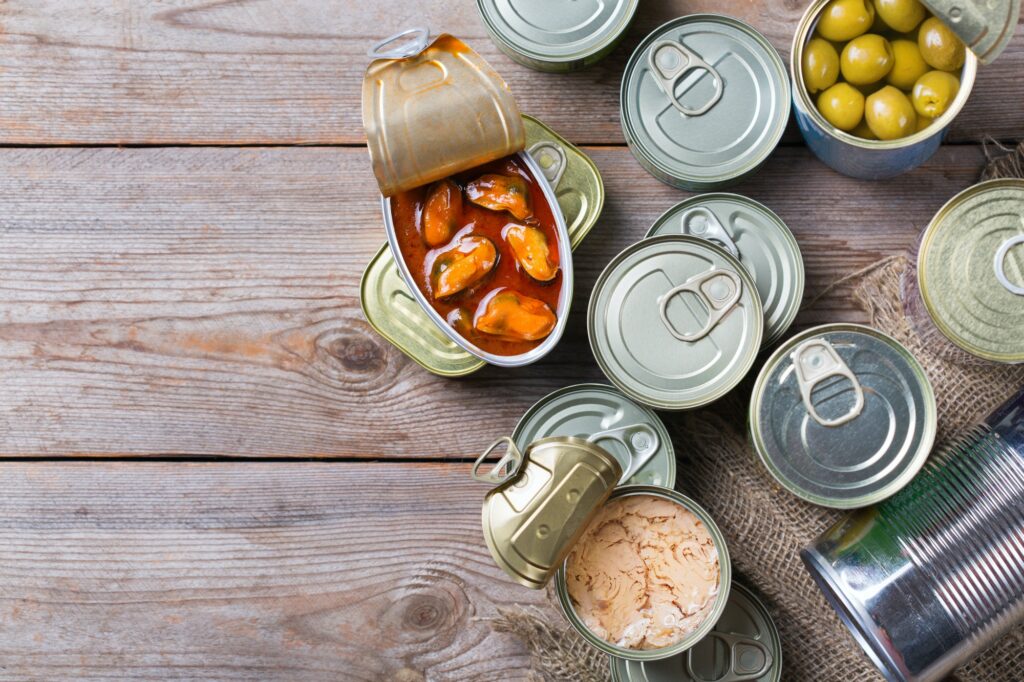 Canned preserved food, non-perishable goods, donations concept