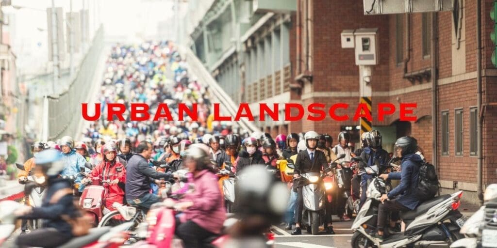 Moto commuters navigating through a bustling city street.