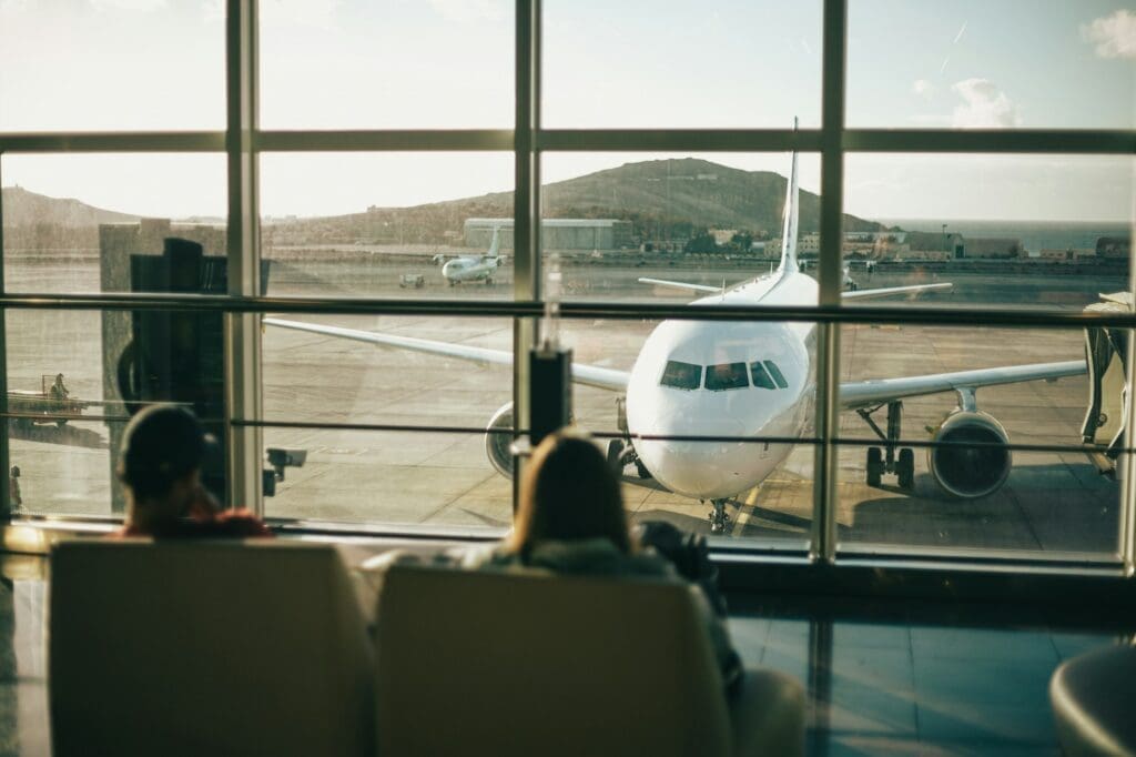 At the airport, a plane through the airport window